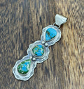 Navajo Handmade Sterling Silver Sonoran Gold Turquoise Stamped Drop Pendant